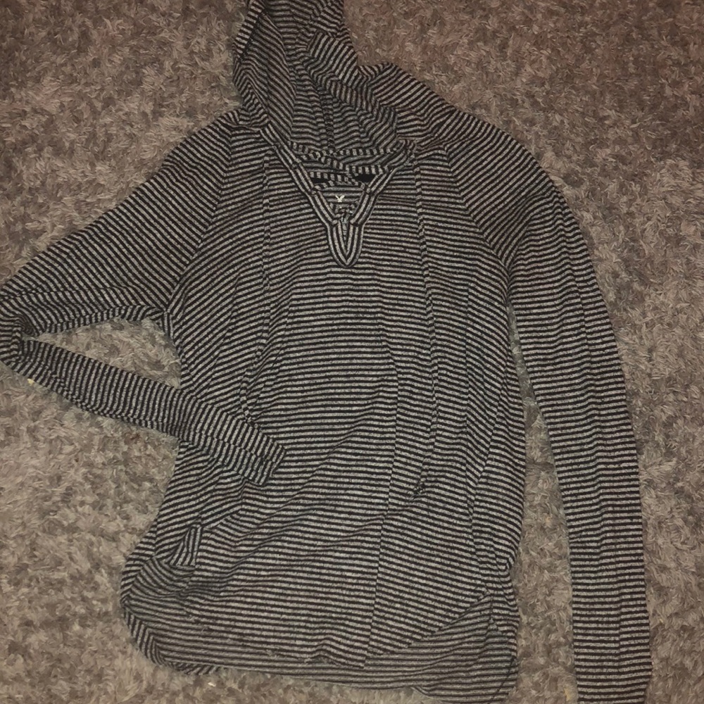 black and gray striped sweater with tie and hood